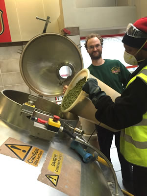 Brewing Team Leader Henry Kirk adds Goldings hops and Orange Peel to the copper to make 170th Anniversary Celebration Ale