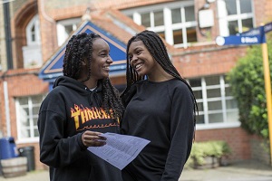 Students at Willliam Morris Sixth Form celebrate A Level result