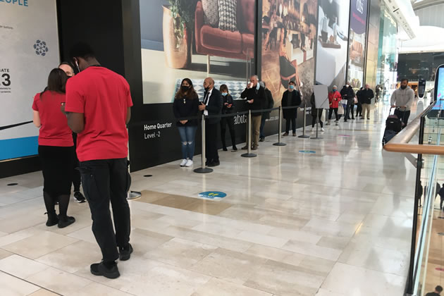 A queue of shoppers outside the Apple shop at Westfield