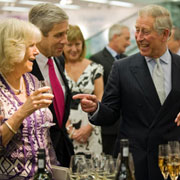 TRH and Sir Stuart Rose of Marks and Spencer sample some wine during a tour of the company's Westfield store