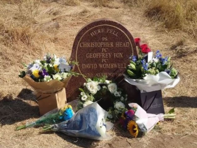 Flowers at the memorial to the murdered officers 