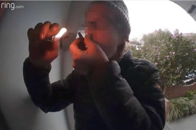 Man smoking a 'crack pipe' on a resident's doorstep in Shepherd's Bush